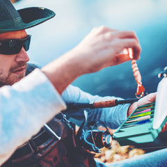 Assorted 5-color crappie shad lures laid out