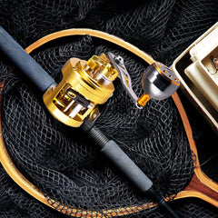 Gold Abu round baitcast reel handle grip - side view