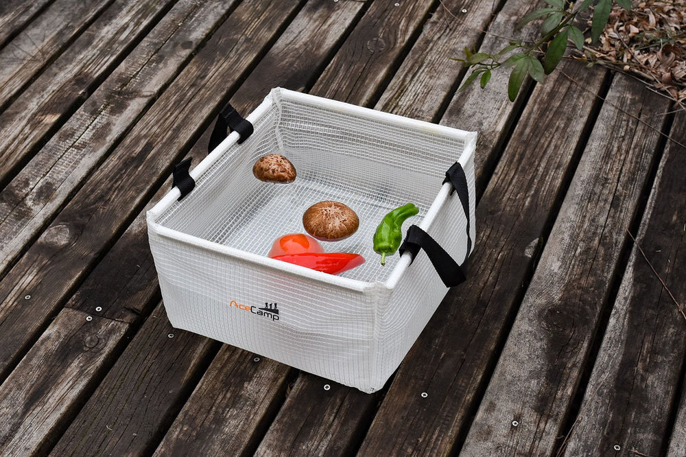 AceCamp durable vinyl basin demonstrates compact storage and portability