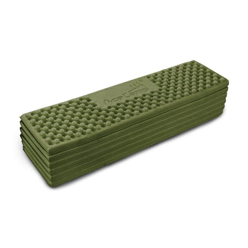 AceCamp sleeping pad green color shown in outdoor setting for gear organization