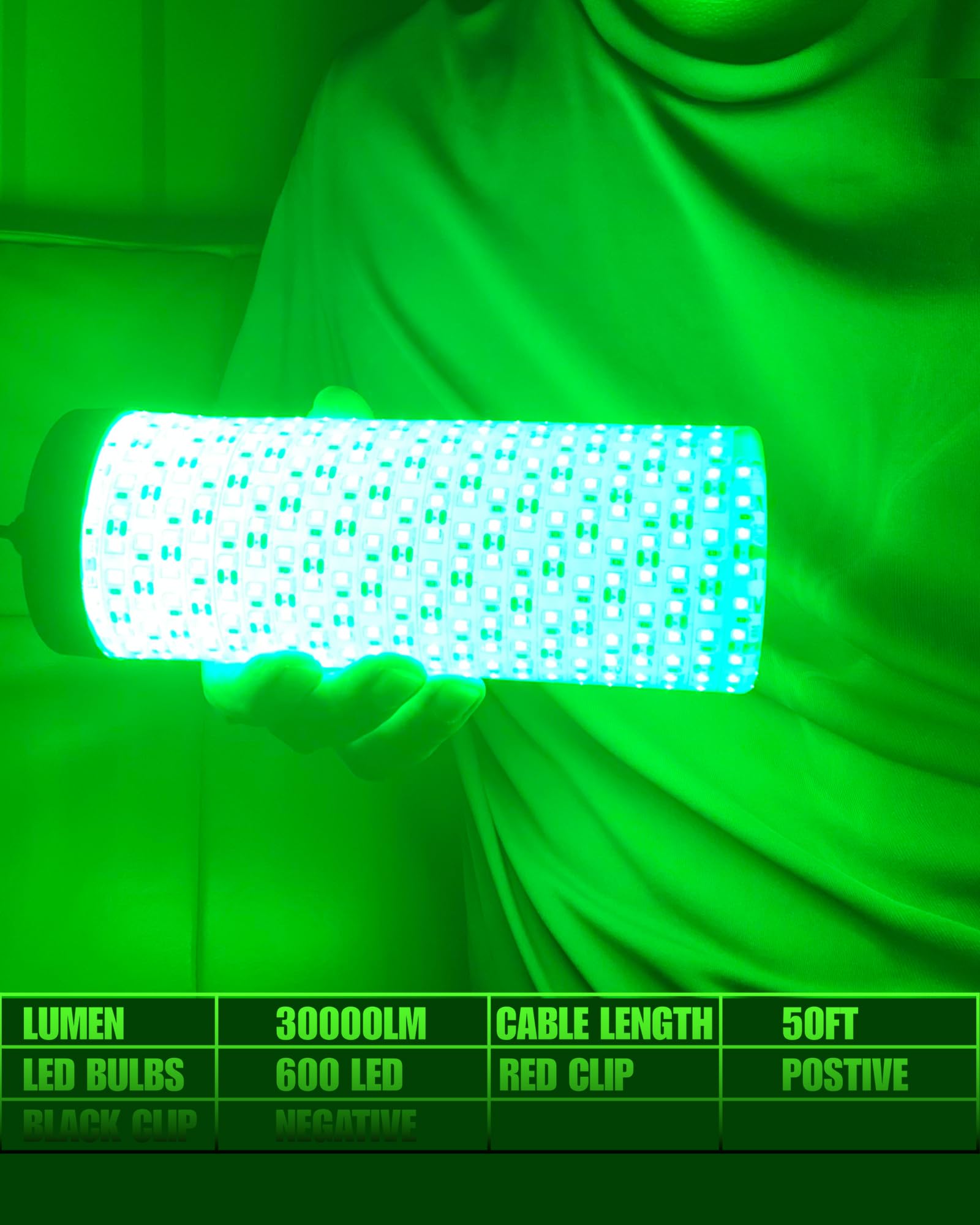 Green 30,000 lumen fishing light submerged in water