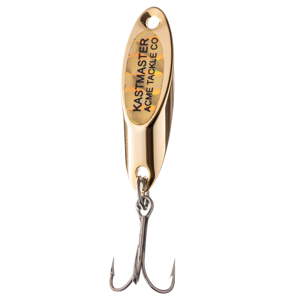 Acme Kastmaster W/TP 1/24oz gold on water surface angle promotes striking action.