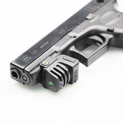 Ade Advanced Optics LSL8G-1 green laser sight mounted on a rail for fast targeting.