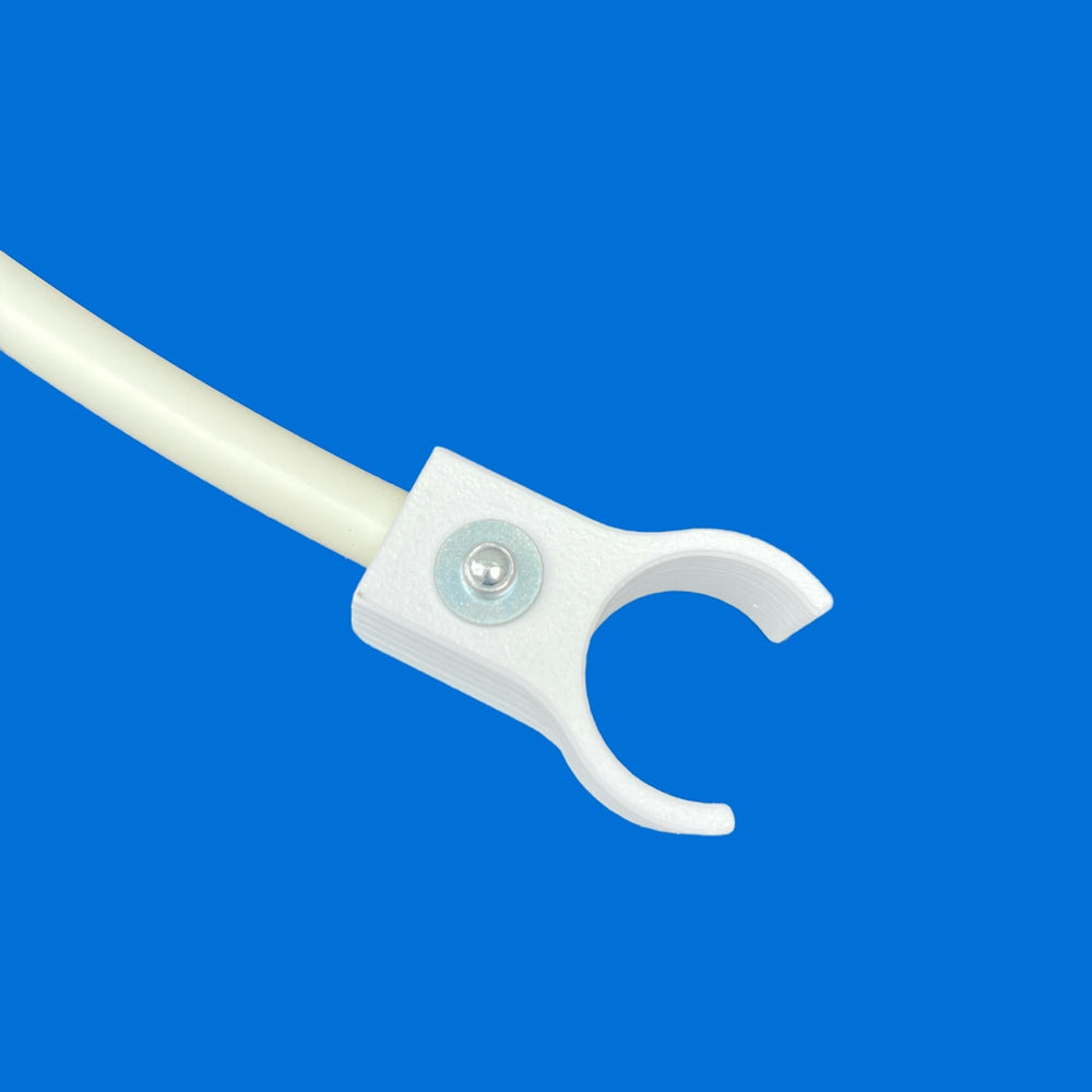 Adjustable-height clip demonstrates precise fitting on standard home-made poles.