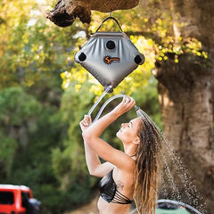 Advanced Elements Summer Shower reflector panel enhances heat capture for faster warm showers.