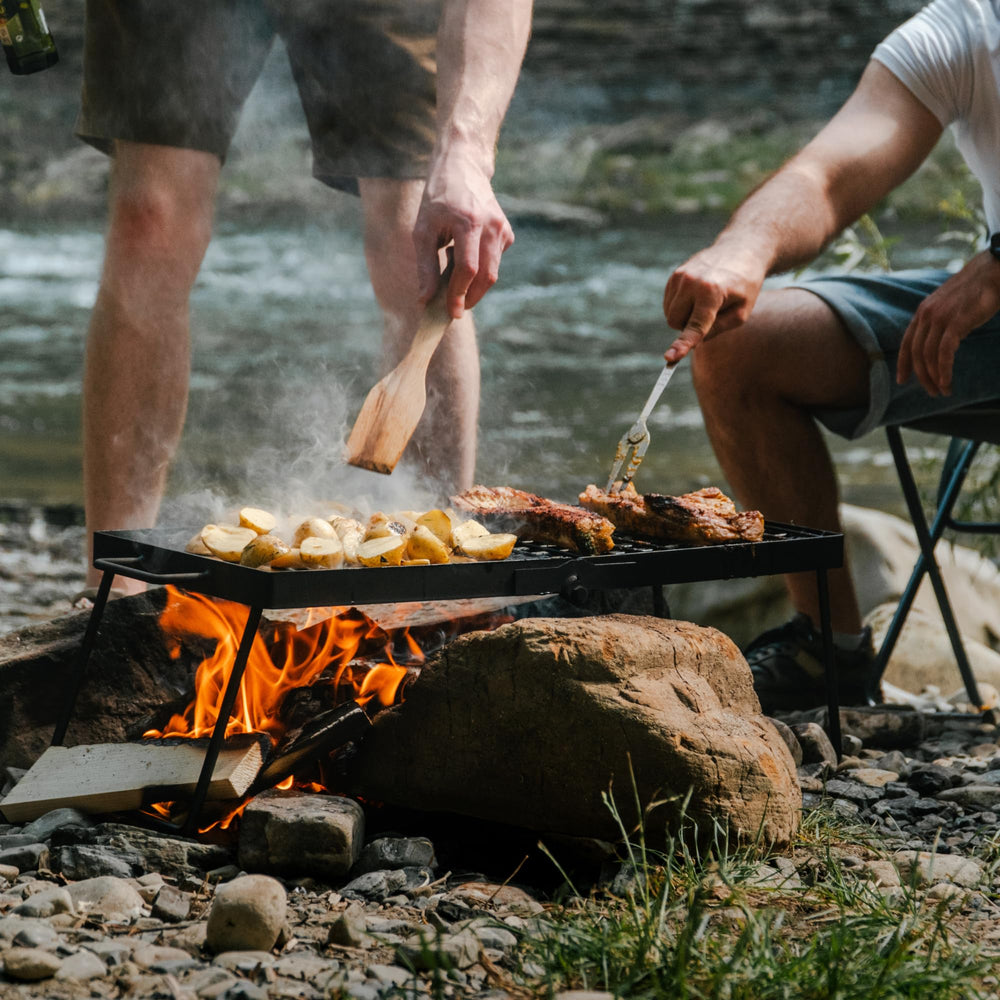 Adventure Seeka Campfire 24in ambient setup ready for campfire cooking anywhere outdoors.