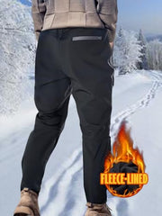 Afwerirc men's back zip pocket detail, secure valuables during tasks.