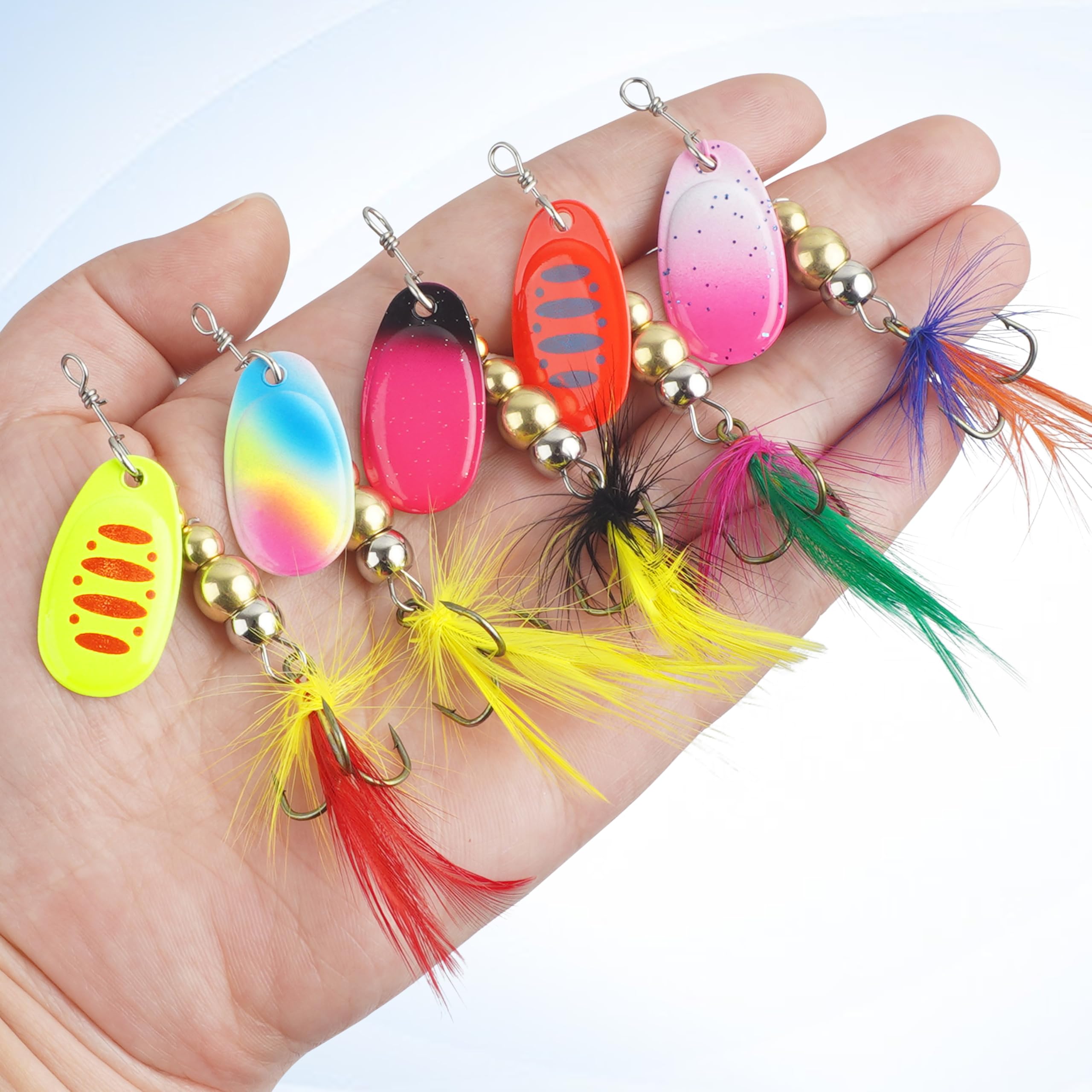 Five spinner lures displayed in tackle box