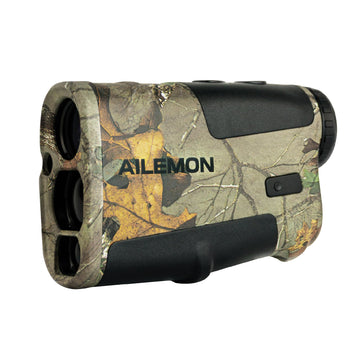 AILEMON AL51 rangefinder in forest view highlighting long-range hunting capability.