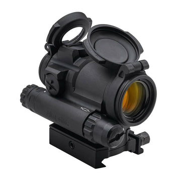 Aimpoint CompM5s mounted on rifle in field use for rapid target acquisition.