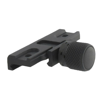 AimPoint QRP Base mounted on rifle rail, reliable quick detach for adaptable configurations.