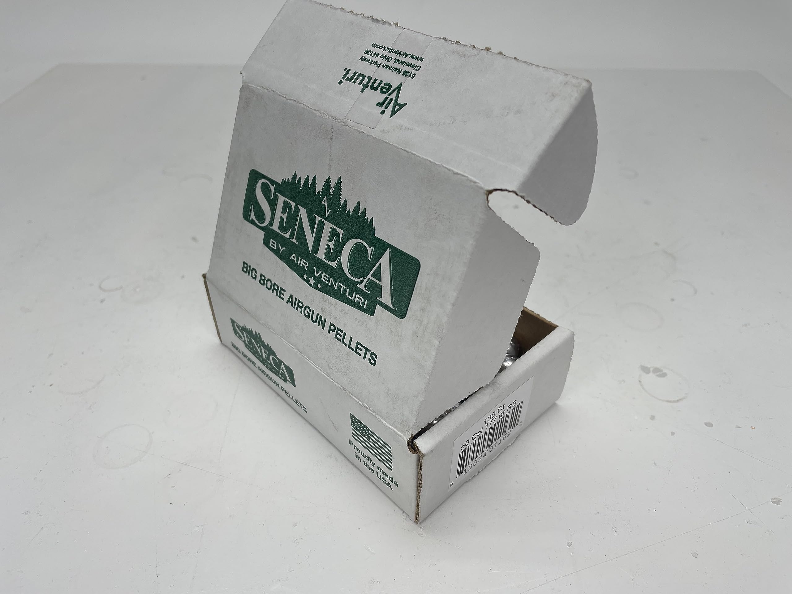 Air Venturi Seneca round-ball pellets close-up showing smooth surface for reliable feeding.