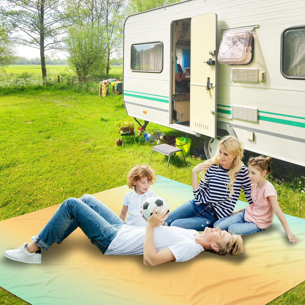 AISPARKY beach mat in park setup ideal for family picnics.
