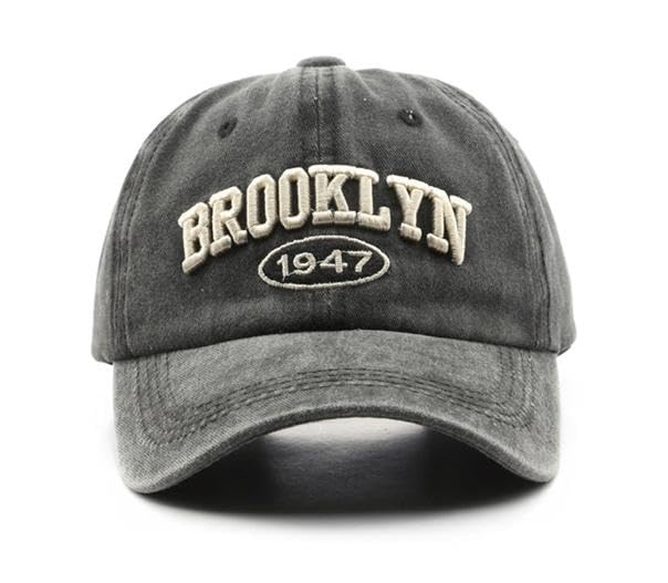 Ajux Brooklyn-style baseball cap detail in grey denim.