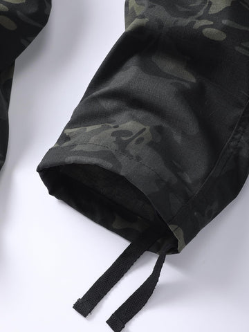 AKHIKING men's camo cargo pants worn on hike for versatile outdoor performance.