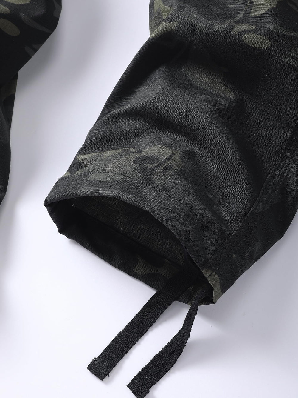 AKHIKING men's camo cargo pants worn on hike for versatile outdoor performance.