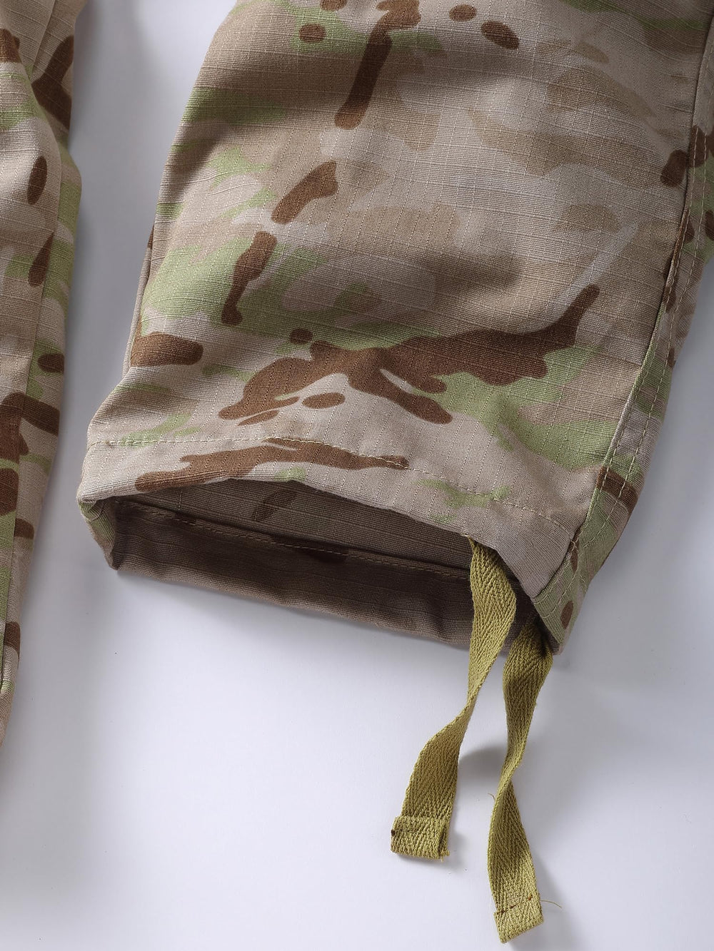 AKHIKING outdoor-wear shot emphasizes rugged outdoor use with camouflage styling.