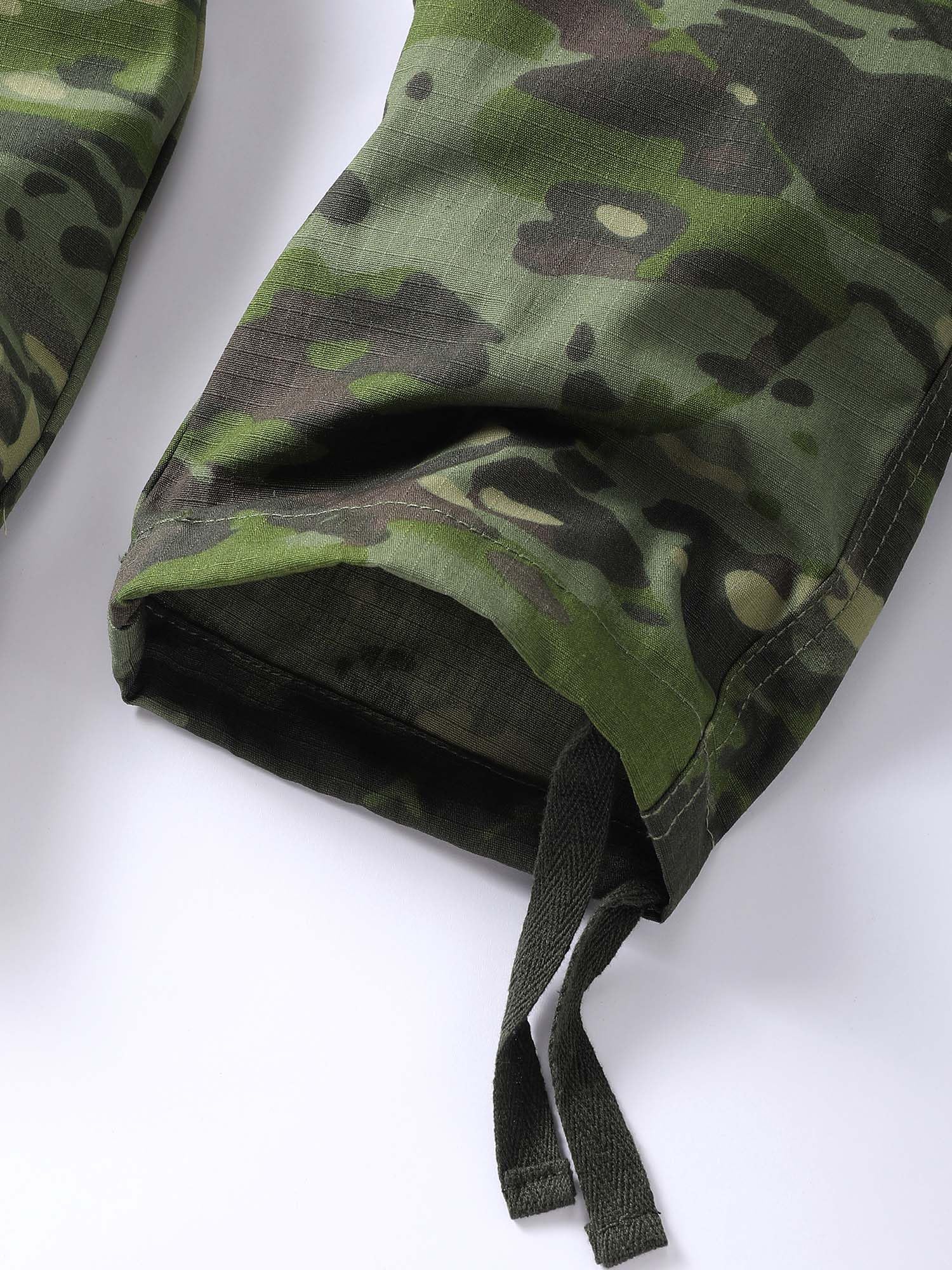 AKHIKING camo cargo pants in action for versatile outdoor scenarios.