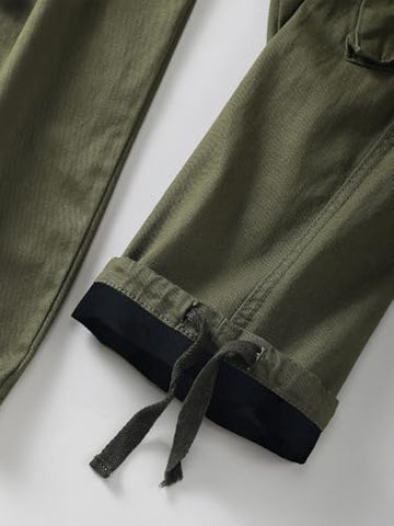 AKHIKING cargo pants side pocket open demonstrates versatile storage during outdoor activity.