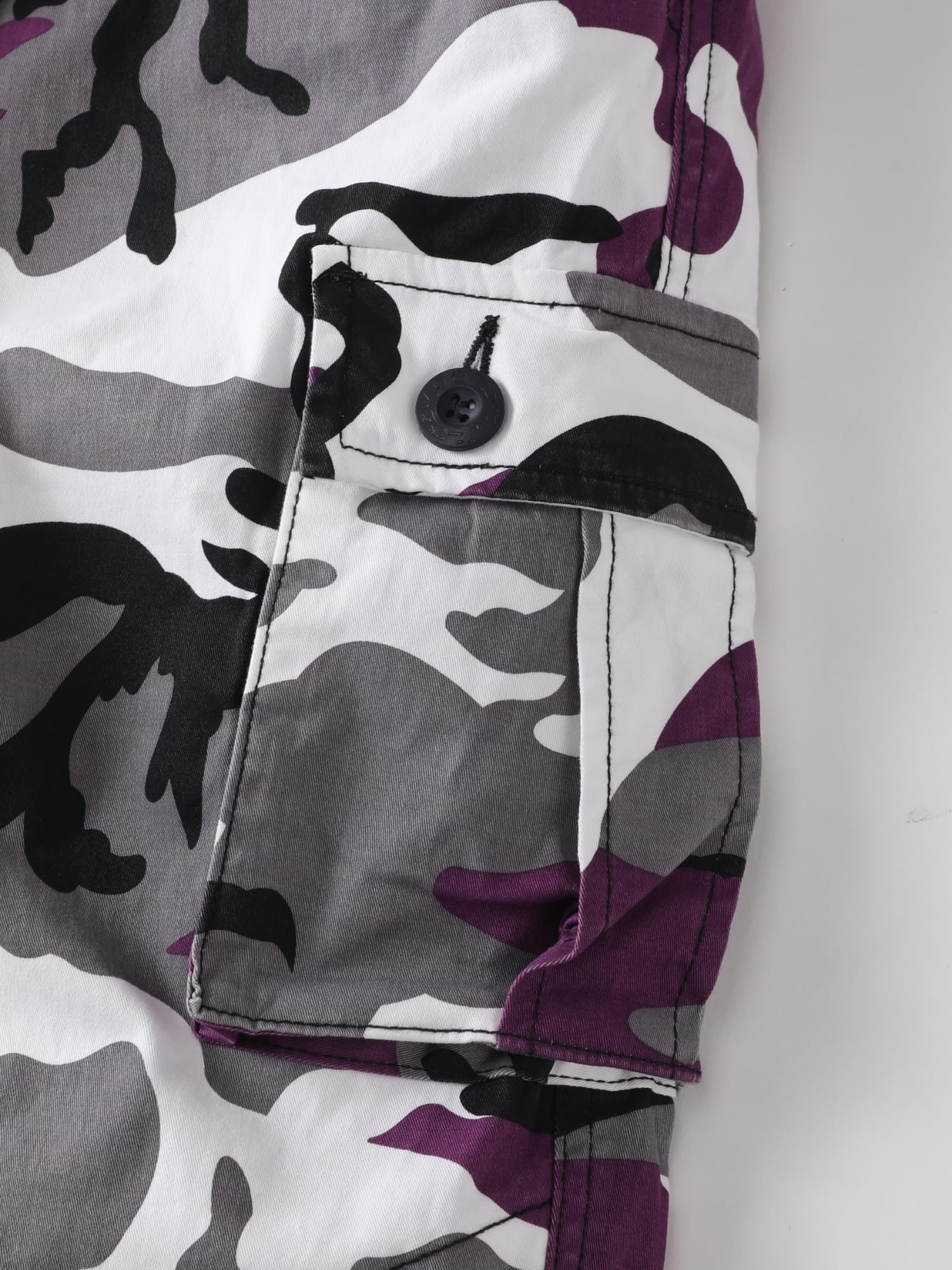 AKHIKING back-pocket detail showcases secure storage for essentials on trails