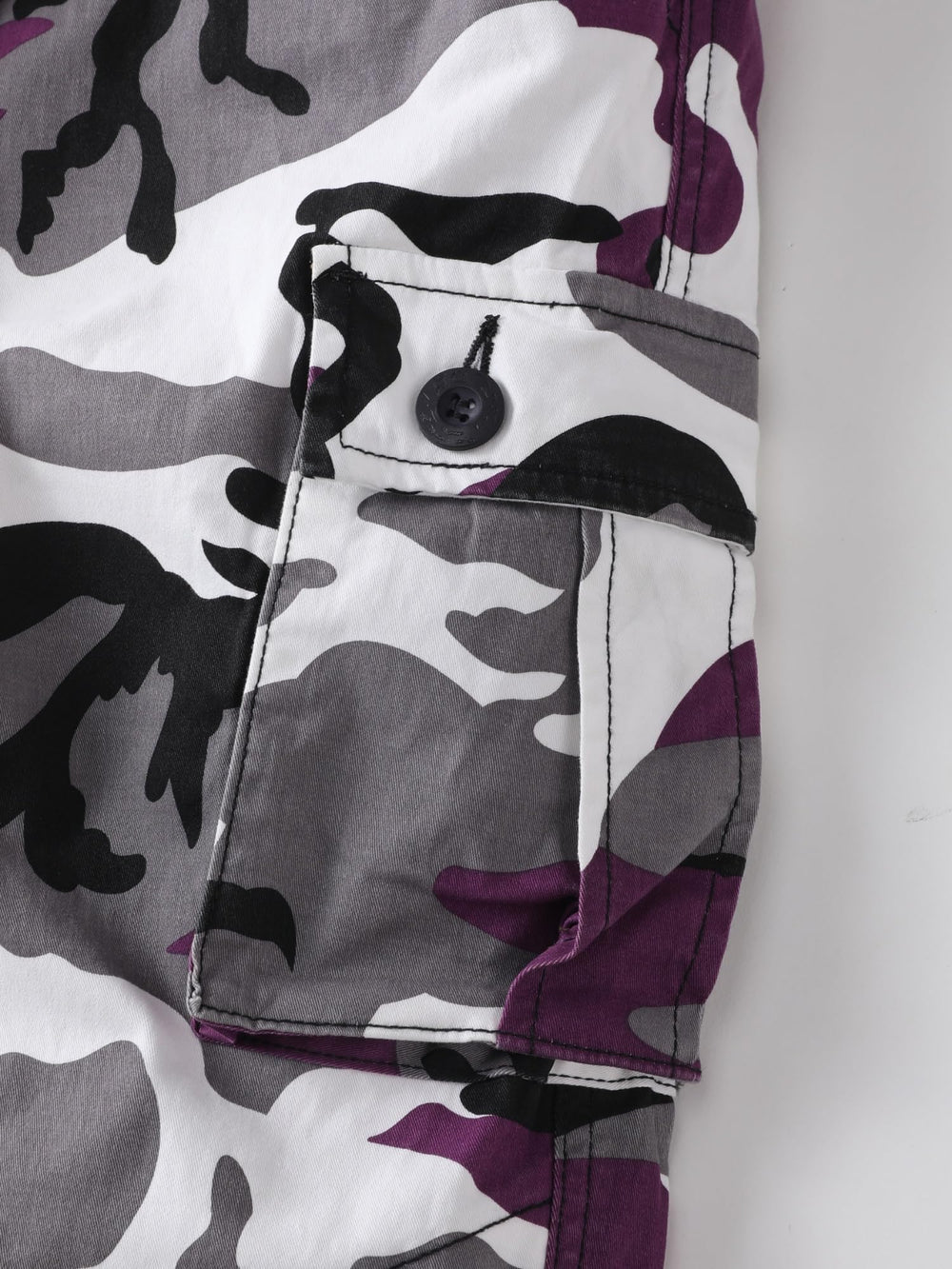 AKHIKING back-pocket detail showcases secure storage for essentials on trails