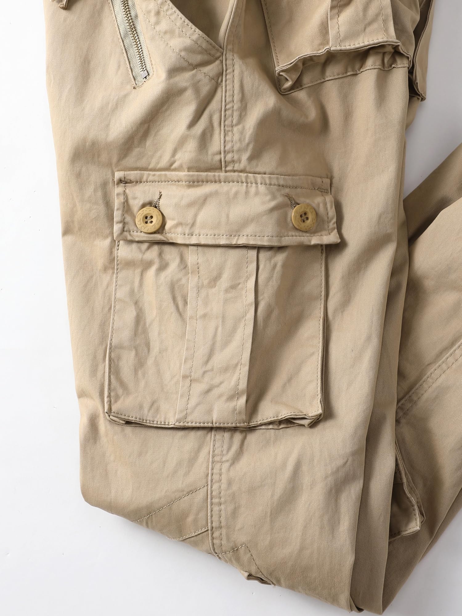 AKHIKING women's cargo pants camo fabric closeup highlights durable ripstop texture.