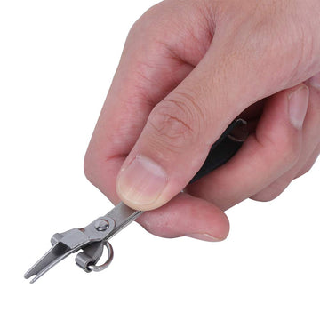 Akozon fly fishing knot tying tool prepared for quick field adjustments.