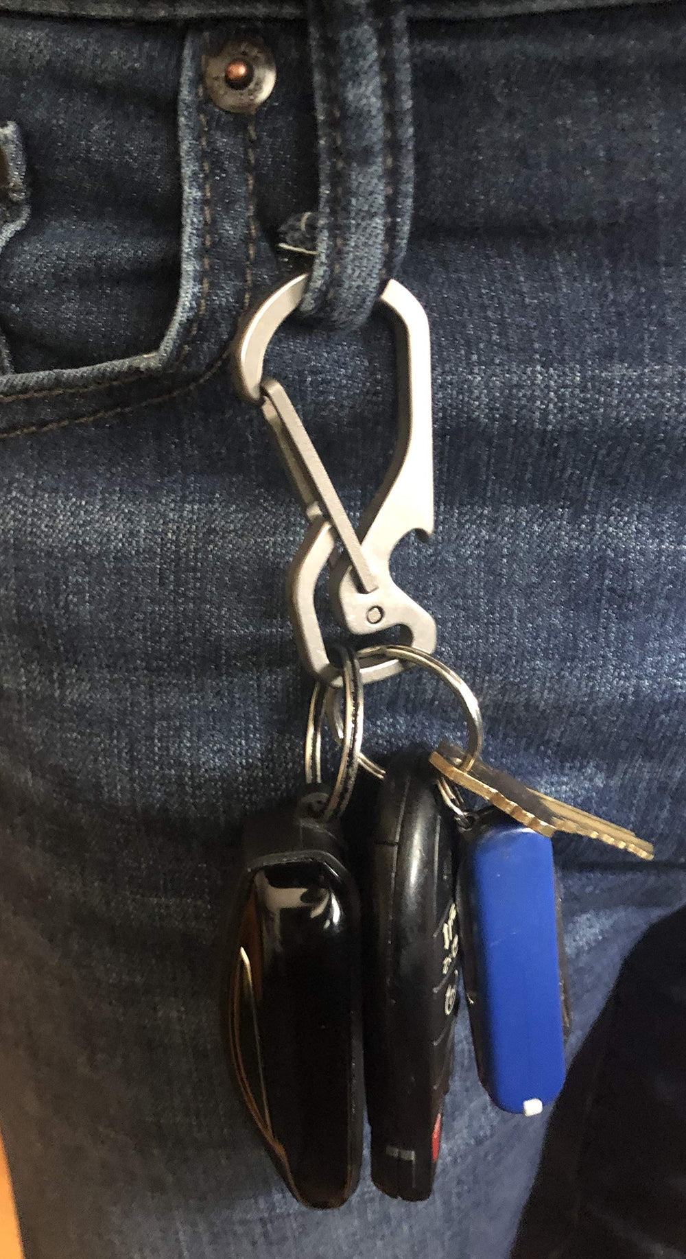 AllGear double-loop titanium carabiner keeps keys secure with quick release.