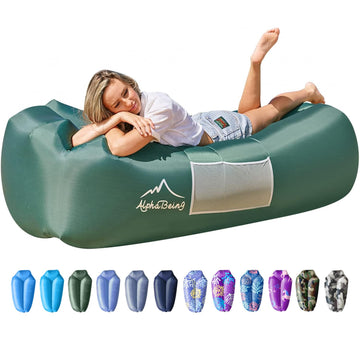 AlphaBeing inflatable lounger on the beach scene for quick relaxation and portability.
