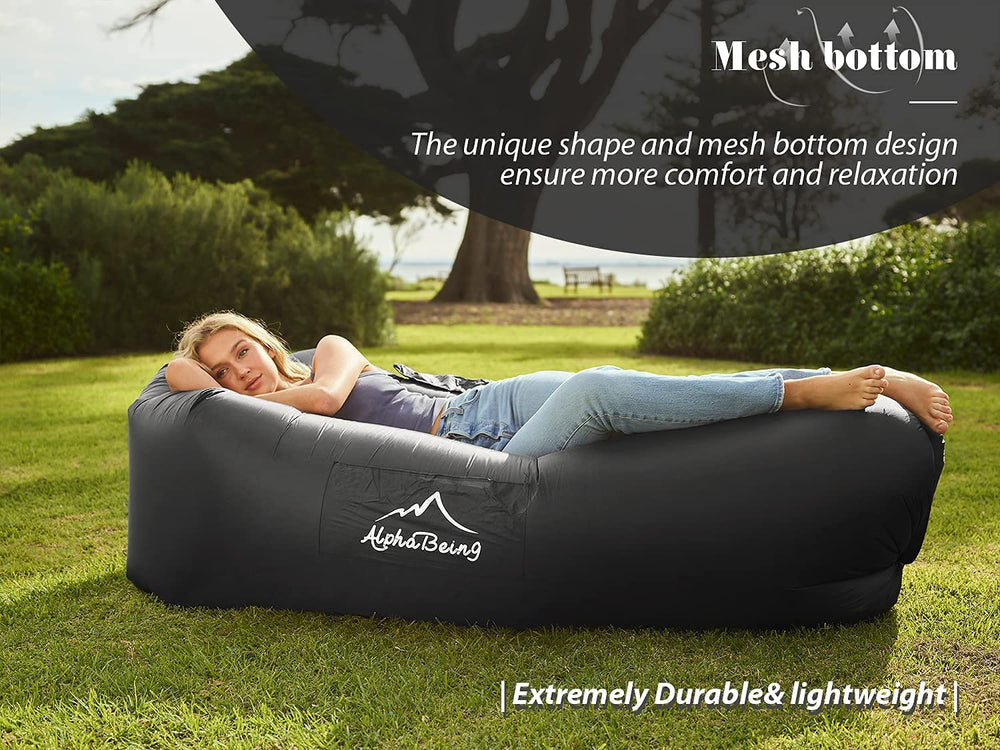 AlphaBeing lounger at the beach highlights travel-ready portability.