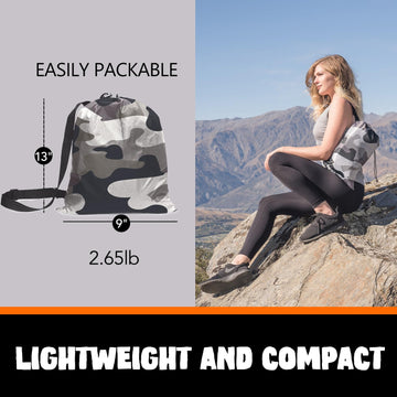 AlphaBeing inflatable lounger fully inflated on the beach for relaxing comfort.