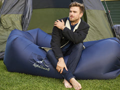 AlphaBeing lounger navy folded compact illustrates easy transport and storage.