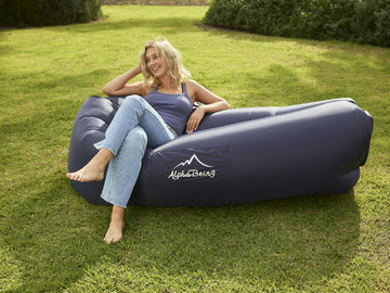 AlphaBeing inflatable lounger navy stakes and security loop help prevent movement in wind.