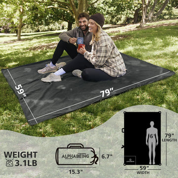 AlphaBeing waterproof blanket on campsite providing warmth and dryness