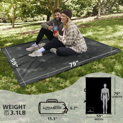 AlphaBeing waterproof blanket on campsite providing warmth and dryness