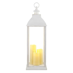 Alpine lantern with three flickering LEDs lights a garden path