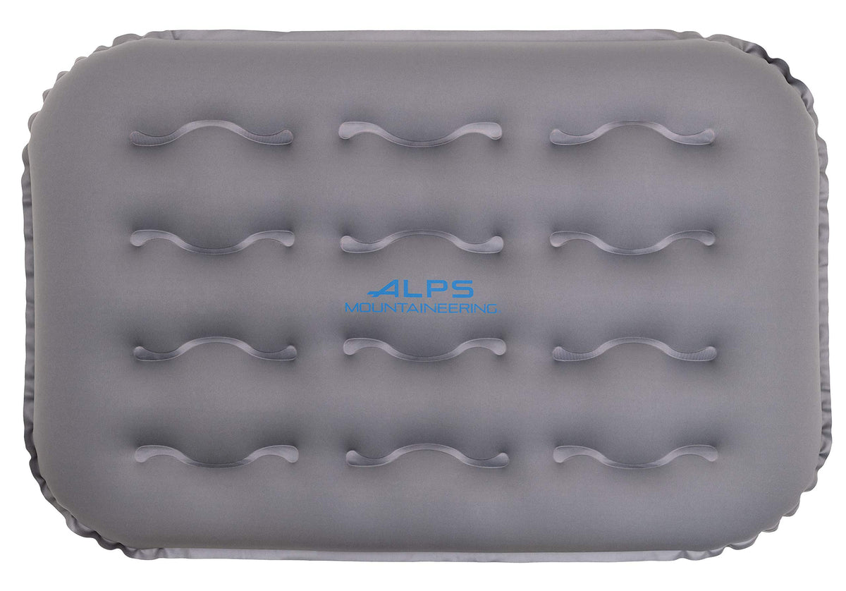 ALPS Mountaineering Air Pillow shows compact pack size for easy backpack travel.