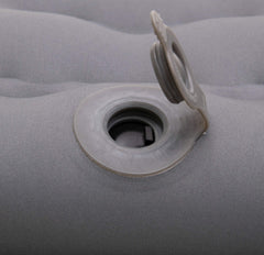 ALPS Mountaineering Air Pillow uses a flat valve for quick inflation and deflation.