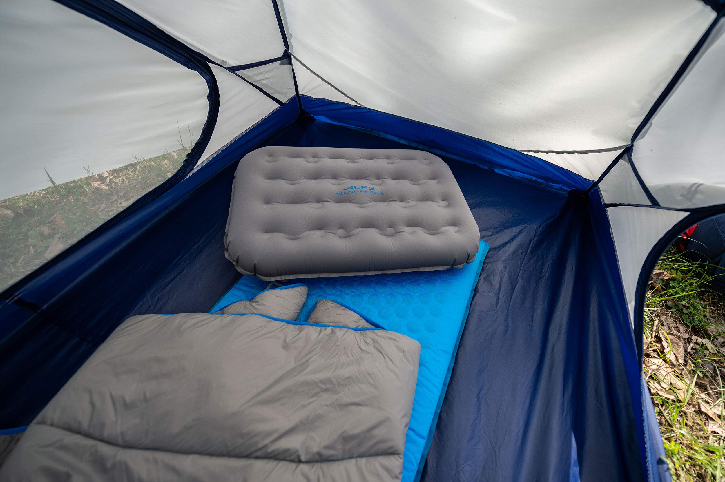 ALPS Mountaineering Air Pillow weighs 8.5 oz for lightweight adventures.