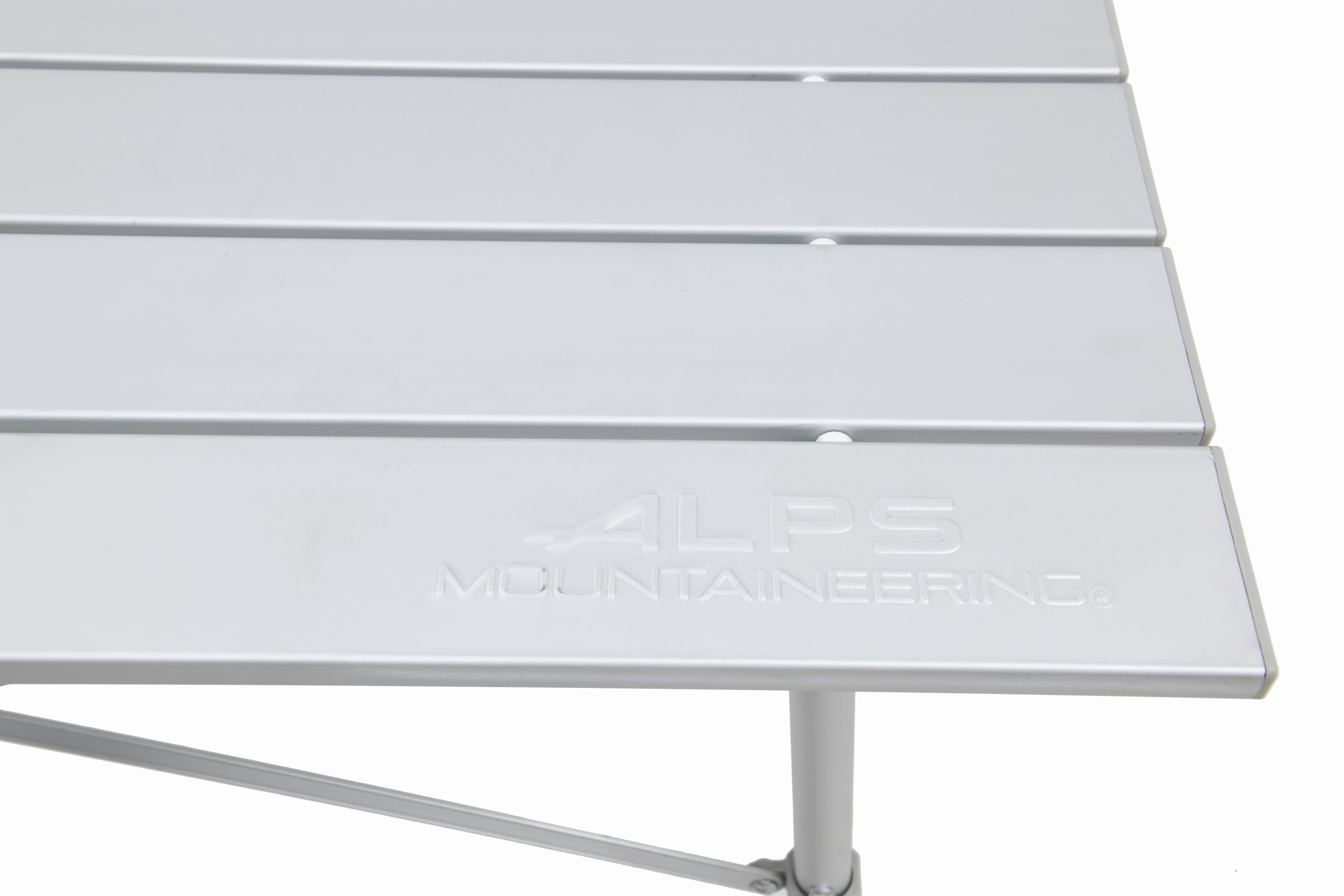 ALPS Mountaineering Camp Table water-resistant finish helps protect the surface outdoors.