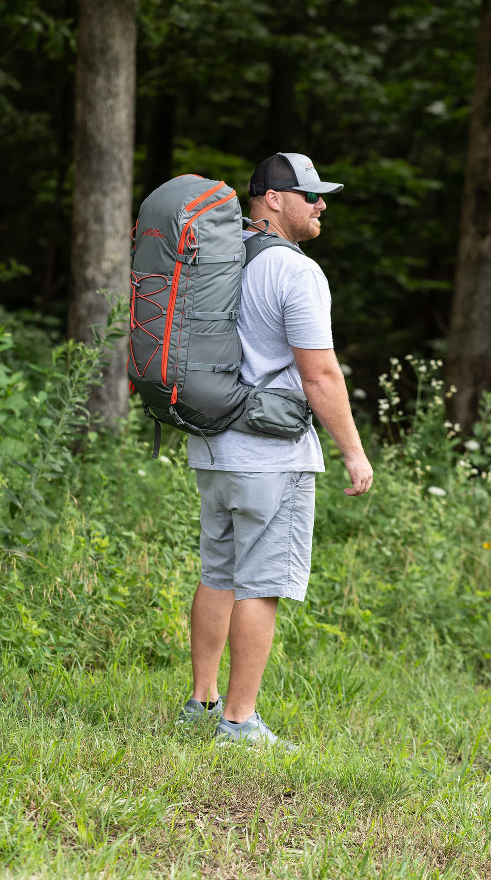 ALPS Mountaineering Canyon 55L mesh valuables pocket for quick stash.