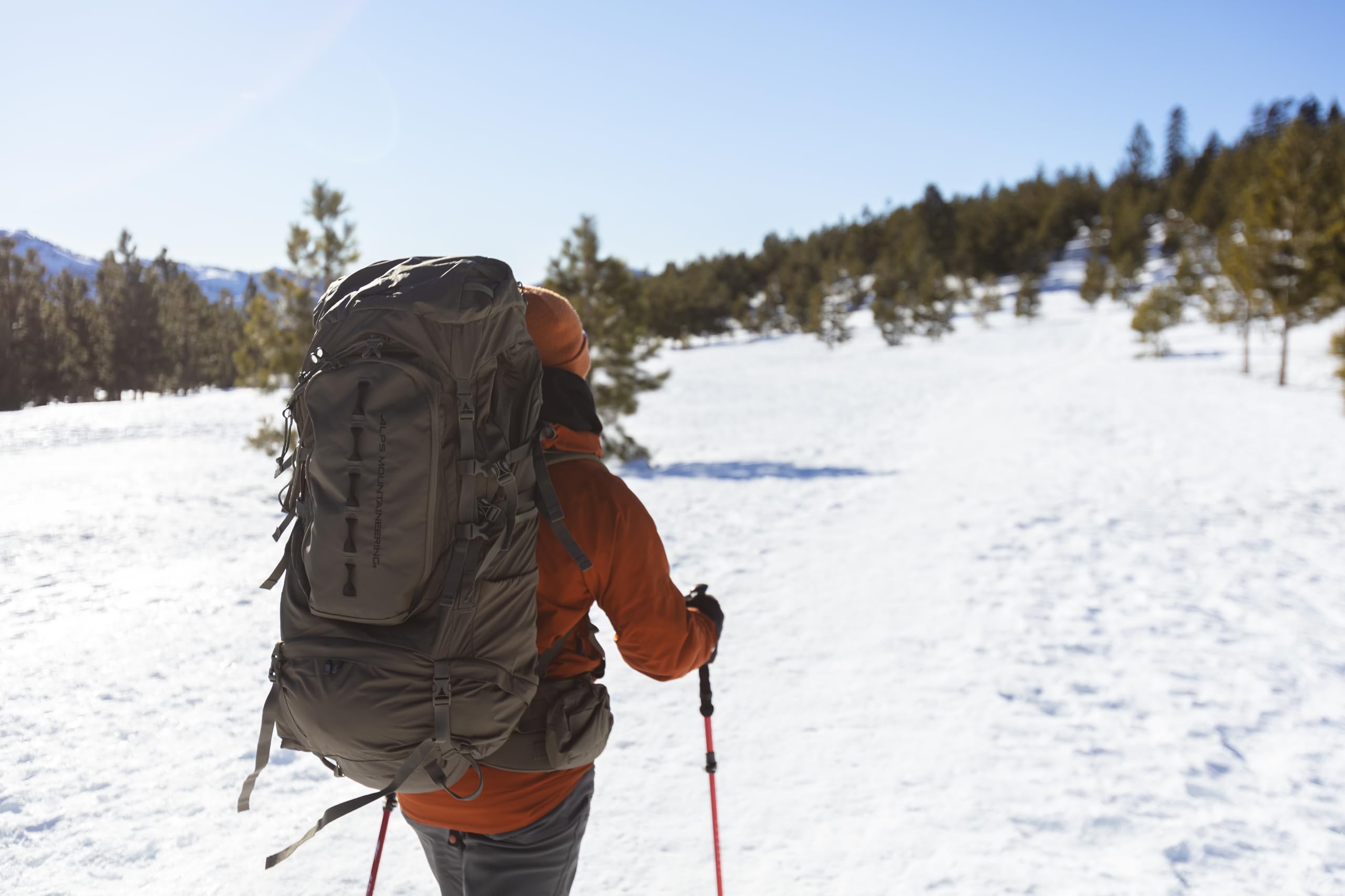 ALPS Mountaineering Cascade 90L pack side bottle pockets for hydration on the go.