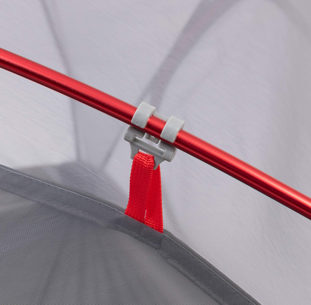 ALPS Mountaineering Helix stakes and guylines included for secure setup.