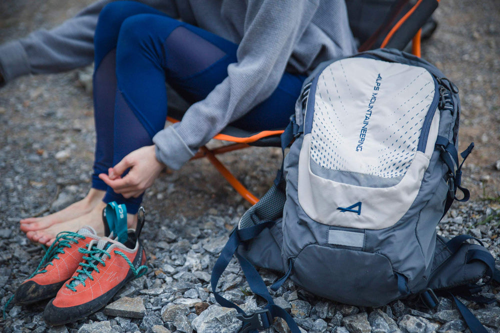 ALPS Mountaineering Hydro Trail 17L reflective details boost visibility in low light.