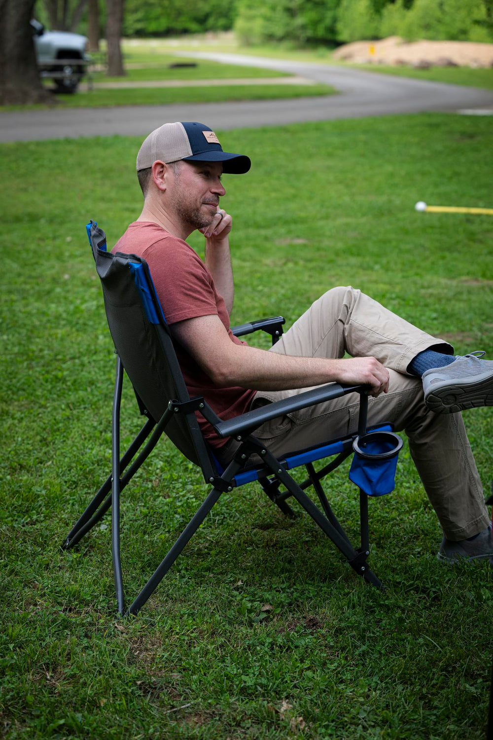 ALPS Mountaineering Leisure Chair blue side view shows portable design