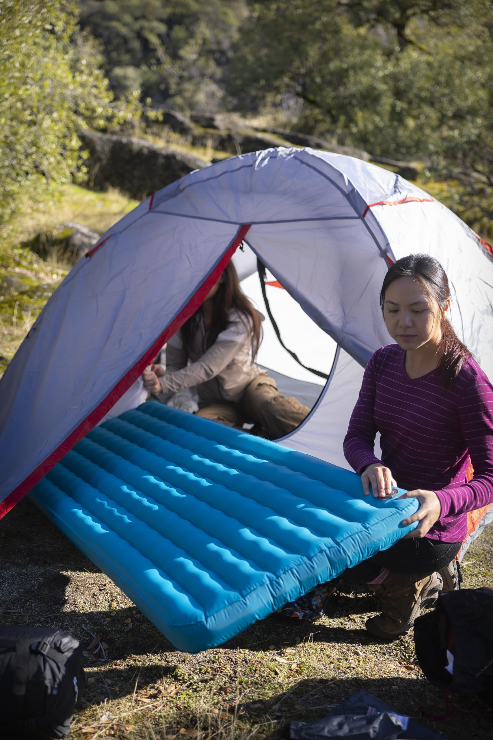 ALPS Mountaineering Pioneer Insulated Air Pad folds into a compact carry size