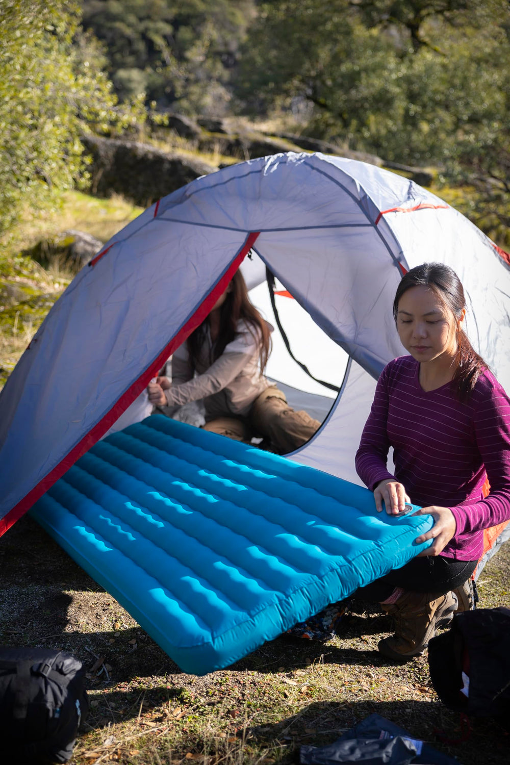 ALPS Mountaineering Pioneer Insulated Air Pad folds into a compact carry size