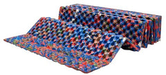 ALPS Mountaineering Reclaimed Foldable Foam Mat Confetti folded for compact packing on trips.
