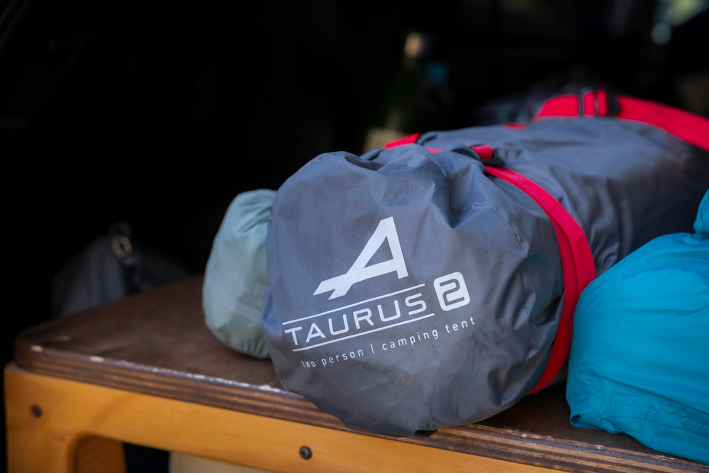 ALPS Mountaineering Taurus stakes and guylines ensure stability.