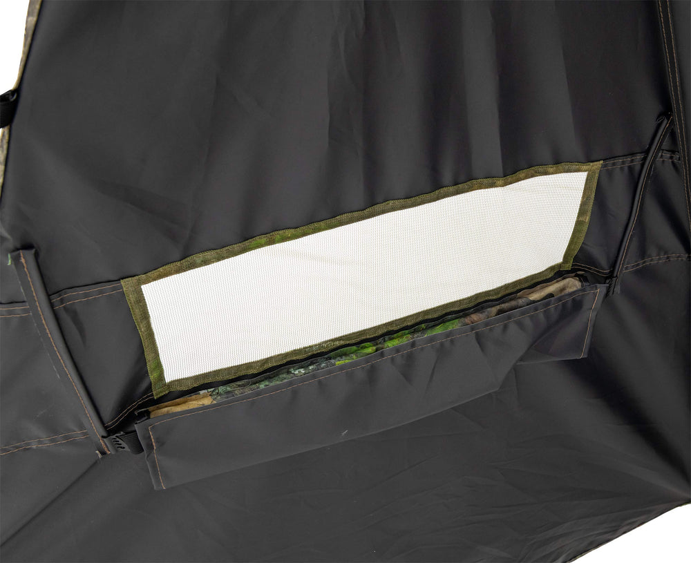 ALPS OutdoorZ Dash Panel Blind attached ground stakes ensure stable setup on rough ground.